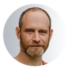 A person with a beardAI-generated content may be incorrect.