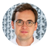 A person wearing glassesAI-generated content may be incorrect.